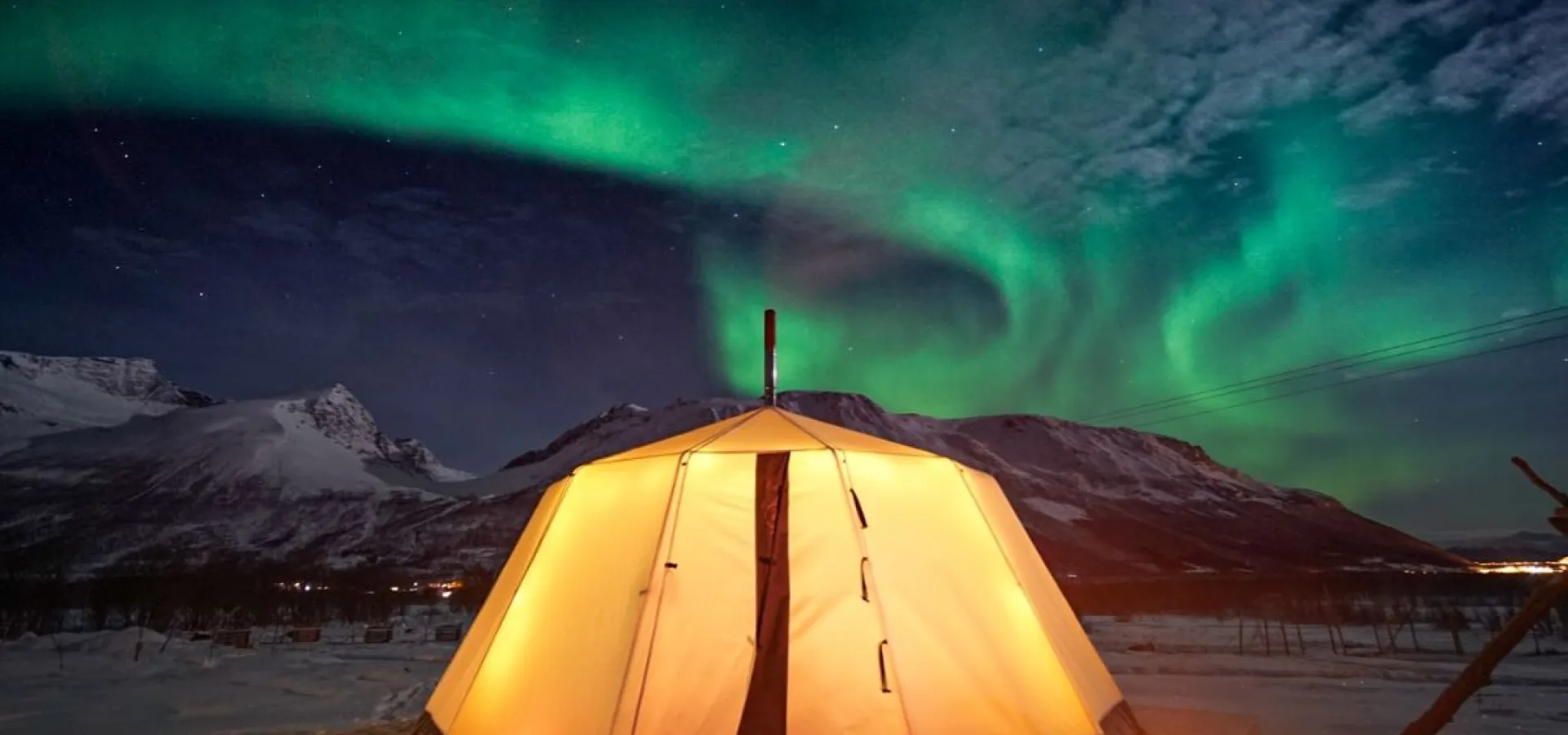 Overnight in Lavvo and Reindeer Feeding with Chance of Northern Lights