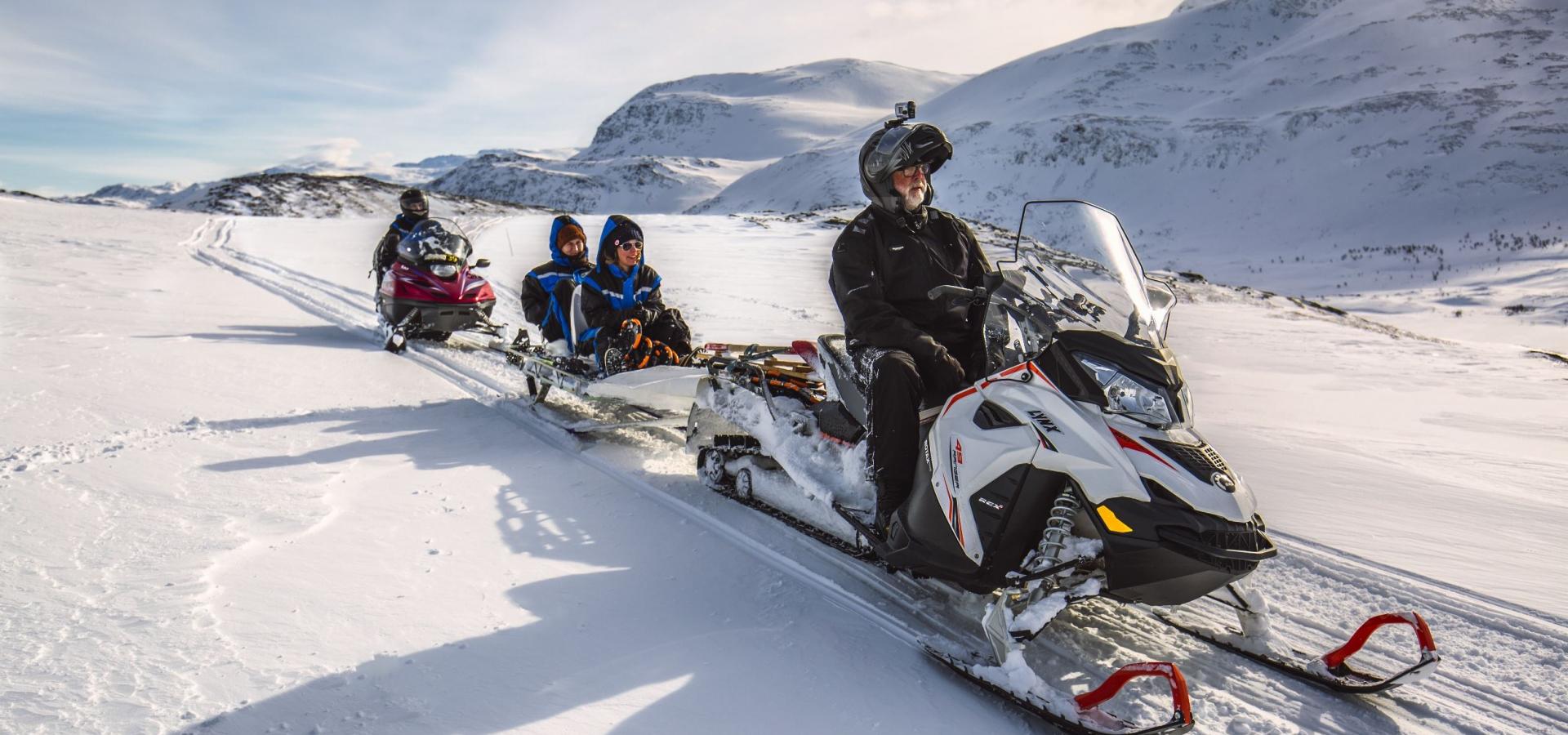 Snowmobiling at Uløya.