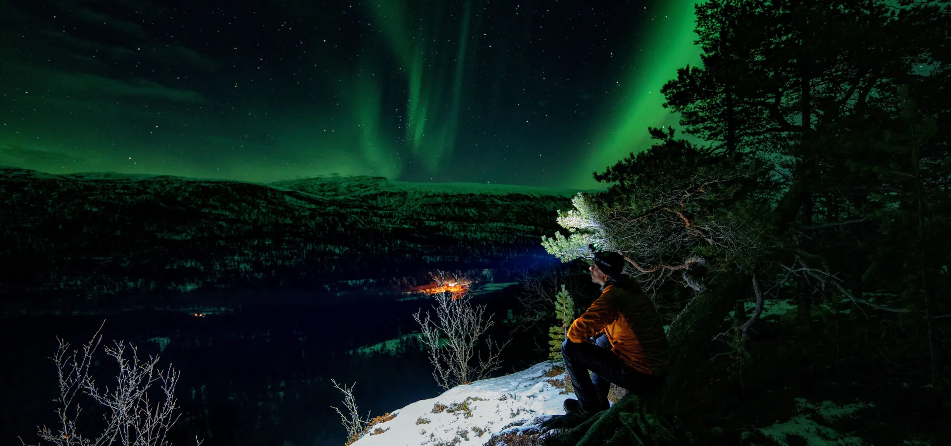Snowshoeing aurora borealis