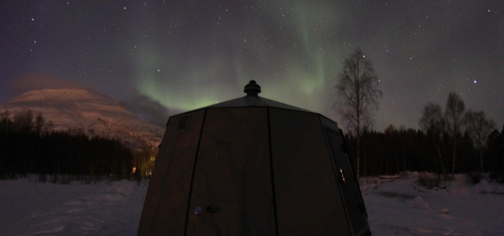Aurora hut, northern lights