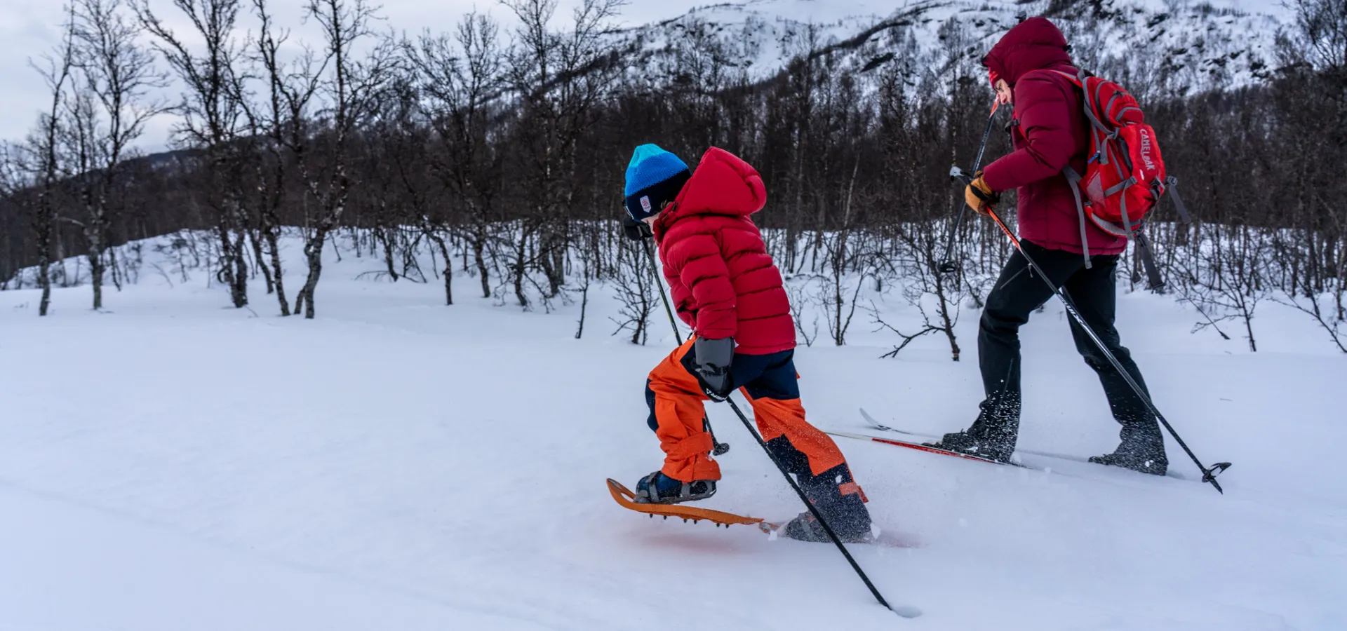 2 persons snowshoeing