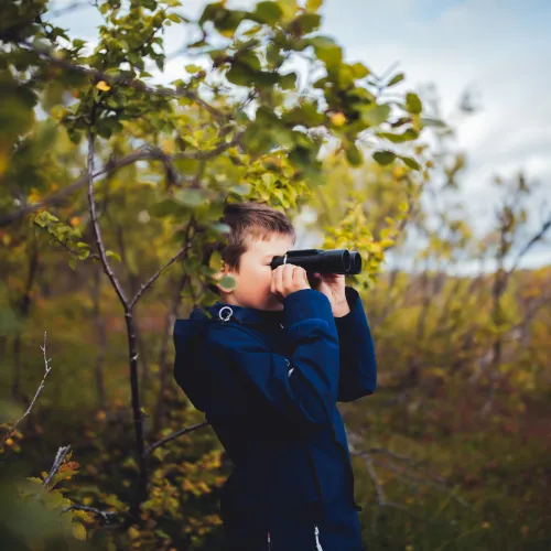 Child with binoculars