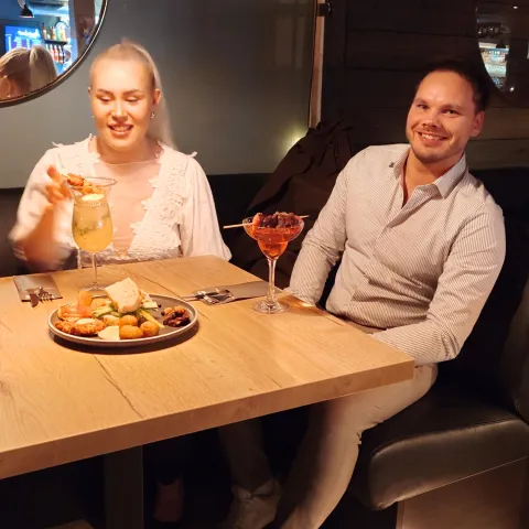 Couple dining in Gastropub, Skjervoy