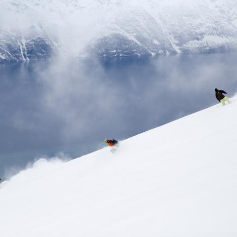 Skiing down towards the Lyngenfjord