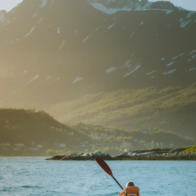Kajaking under the eveningsun on the Lyngenfjord