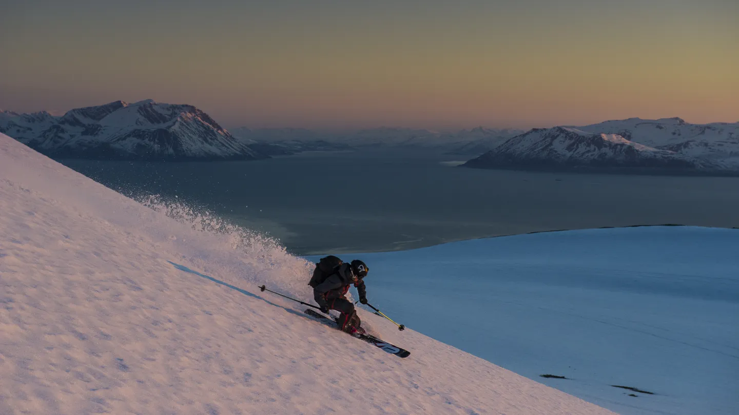 Ski-touring in midnight sun in Lyngen Alps