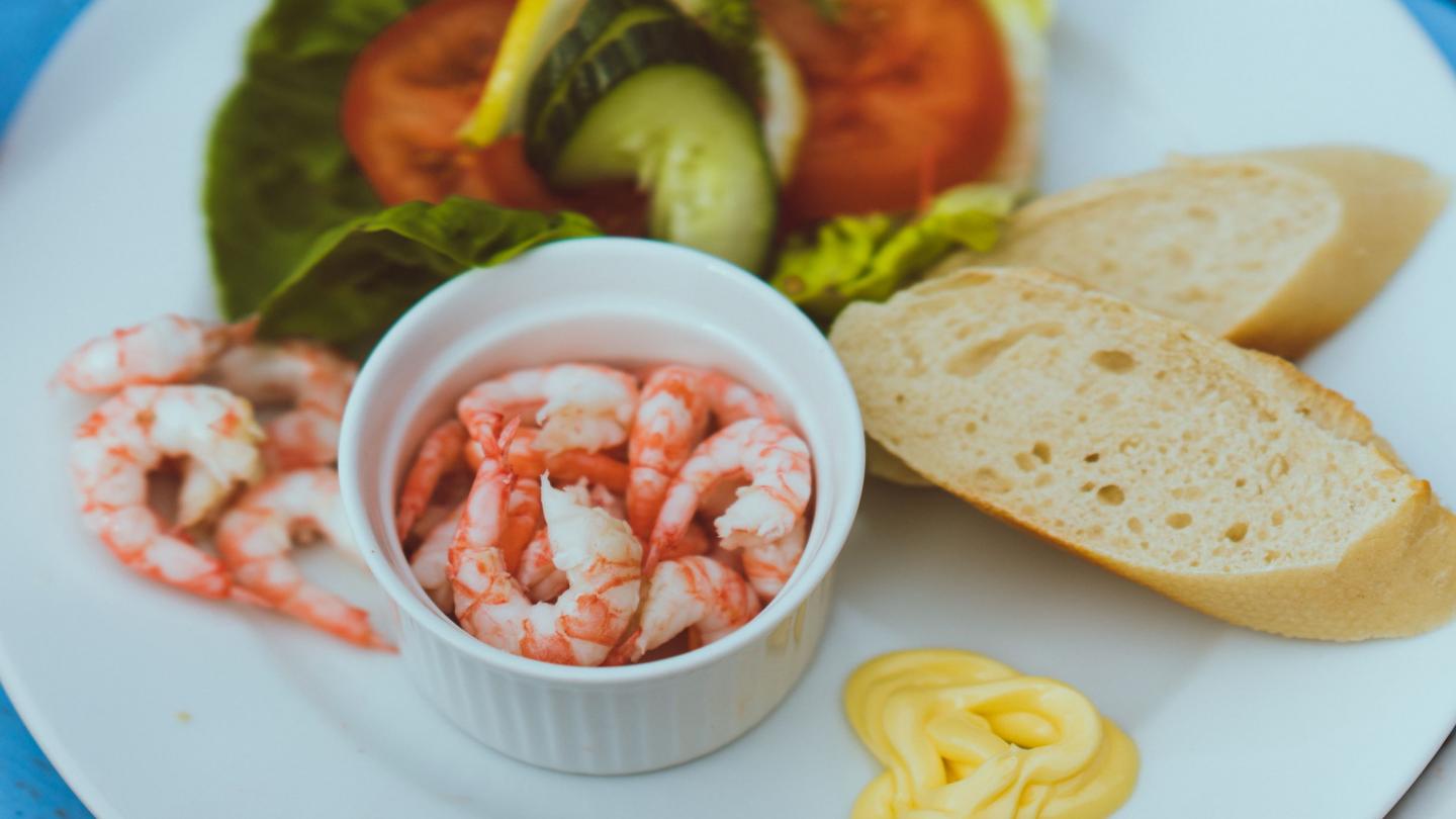 Lyngen shrimps and salad on a plate