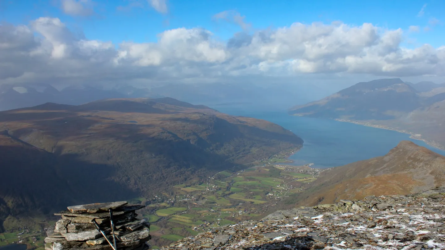 View of Manndalen from the peak Storhaugen - fjord and the Lyngen Alps in the background
